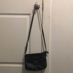 I am selling this black purse with name in front! Useful for everyday!